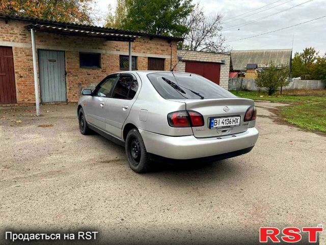 Серый Ниссан Альмера, объемом двигателя 2 л и пробегом 205 тыс. км за 2290 $, фото 3 на Automoto.ua