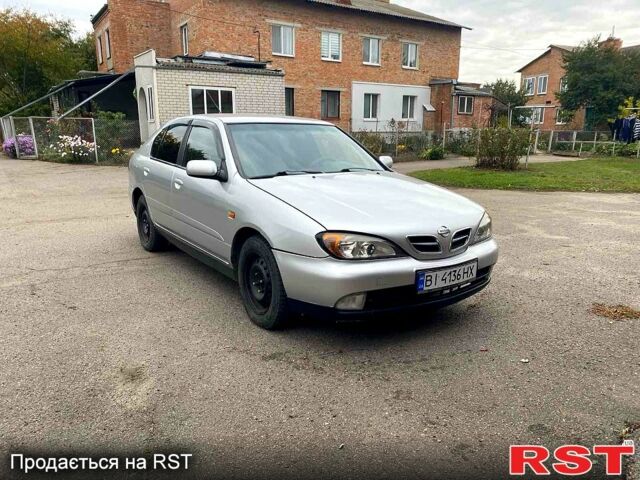 Серый Ниссан Альмера, объемом двигателя 2 л и пробегом 205 тыс. км за 2290 $, фото 1 на Automoto.ua