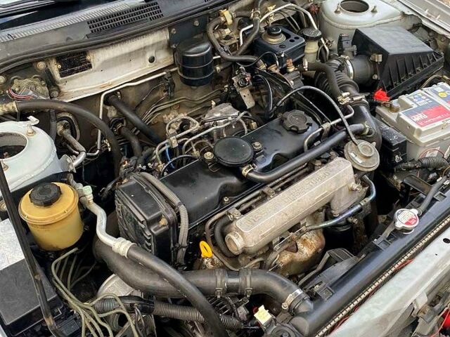 Серый Ниссан Альмера, объемом двигателя 2 л и пробегом 205 тыс. км за 2290 $, фото 8 на Automoto.ua