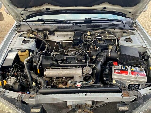 Серый Ниссан Альмера, объемом двигателя 2 л и пробегом 205 тыс. км за 2290 $, фото 9 на Automoto.ua