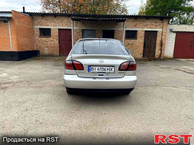 Серый Ниссан Альмера, объемом двигателя 2 л и пробегом 205 тыс. км за 2290 $, фото 4 на Automoto.ua