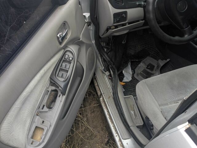 Сірий Ніссан Альмера, об'ємом двигуна 2.2 л та пробігом 470 тис. км за 1500 $, фото 3 на Automoto.ua