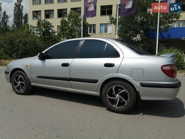 Серый Ниссан Альмера, объемом двигателя 1.5 л и пробегом 257 тыс. км за 4500 $, фото 6 на Automoto.ua