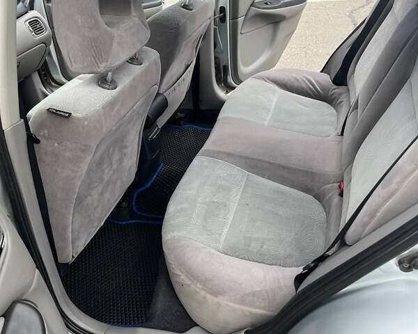 Серый Ниссан Альмера, объемом двигателя 1.8 л и пробегом 372 тыс. км за 2600 $, фото 12 на Automoto.ua