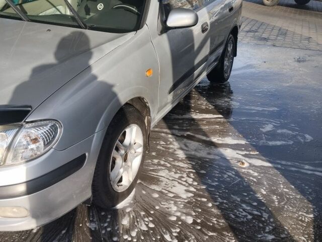 Серый Ниссан Альмера, объемом двигателя 1.5 л и пробегом 351 тыс. км за 3800 $, фото 4 на Automoto.ua