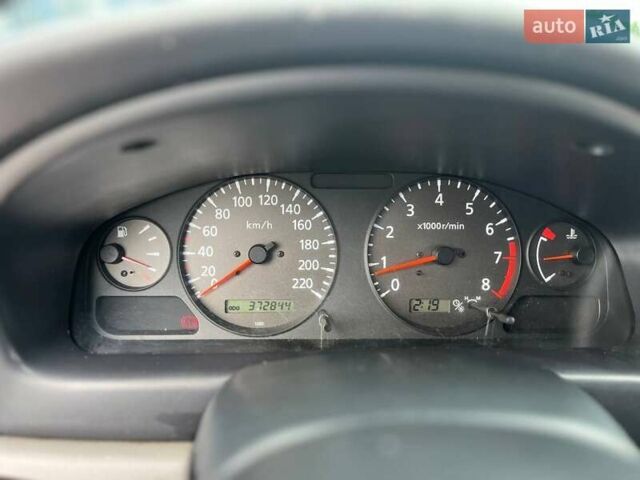 Серый Ниссан Альмера, объемом двигателя 1.8 л и пробегом 372 тыс. км за 2600 $, фото 11 на Automoto.ua