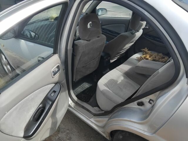 Сірий Ніссан Альмера, об'ємом двигуна 0 л та пробігом 540 тис. км за 2650 $, фото 5 на Automoto.ua