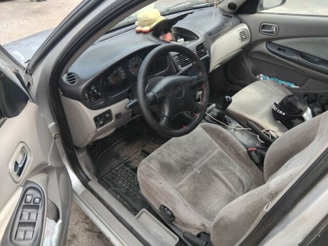 Сірий Ніссан Альмера, об'ємом двигуна 0 л та пробігом 540 тис. км за 2650 $, фото 6 на Automoto.ua