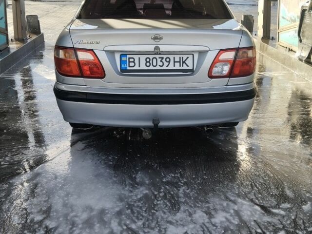 Серый Ниссан Альмера, объемом двигателя 1.5 л и пробегом 351 тыс. км за 3800 $, фото 1 на Automoto.ua