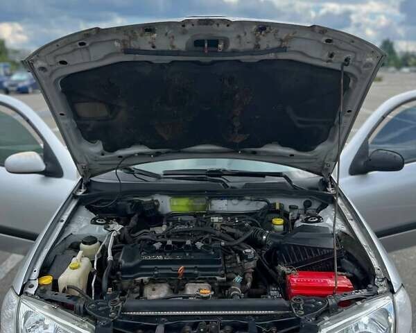 Серый Ниссан Альмера, объемом двигателя 1.8 л и пробегом 372 тыс. км за 2600 $, фото 21 на Automoto.ua