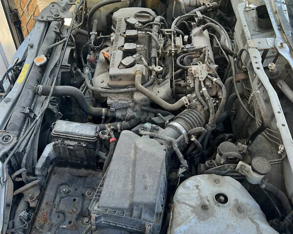 Серый Ниссан Альмера, объемом двигателя 1.5 л и пробегом 240 тыс. км за 1700 $, фото 2 на Automoto.ua