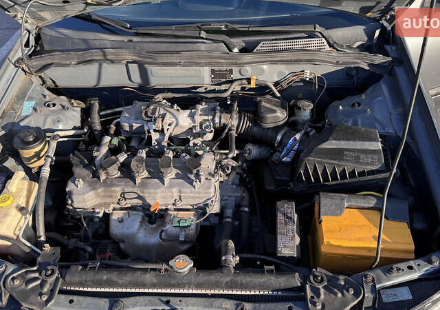 Серый Ниссан Альмера, объемом двигателя 1.8 л и пробегом 181 тыс. км за 4400 $, фото 32 на Automoto.ua