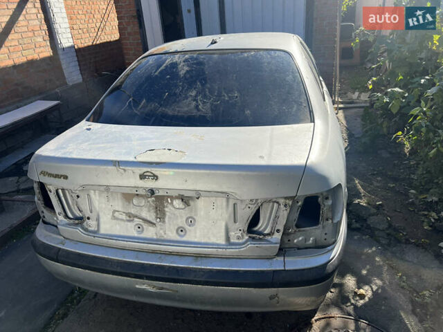 Серый Ниссан Альмера, объемом двигателя 1.5 л и пробегом 240 тыс. км за 1700 $, фото 1 на Automoto.ua