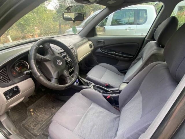 Серый Ниссан Альмера, объемом двигателя 1.5 л и пробегом 227 тыс. км за 2800 $, фото 4 на Automoto.ua