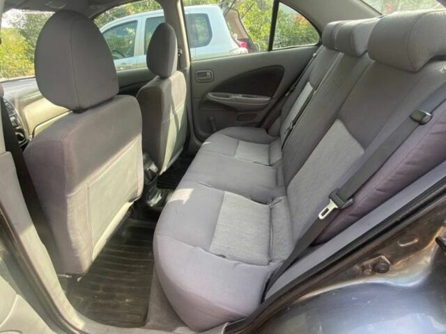 Серый Ниссан Альмера, объемом двигателя 1.5 л и пробегом 227 тыс. км за 2800 $, фото 6 на Automoto.ua