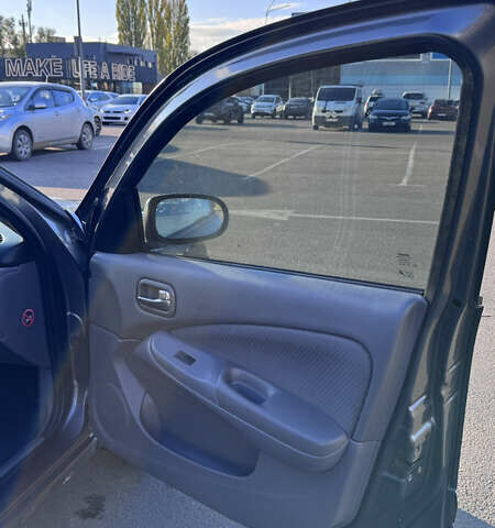 Серый Ниссан Альмера, объемом двигателя 1.8 л и пробегом 181 тыс. км за 4400 $, фото 10 на Automoto.ua