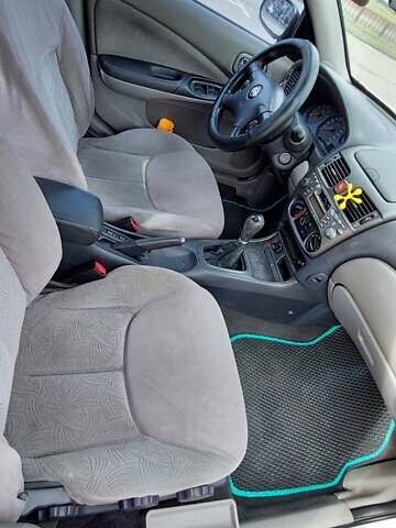 Серый Ниссан Альмера, объемом двигателя 1.5 л и пробегом 253 тыс. км за 2200 $, фото 26 на Automoto.ua