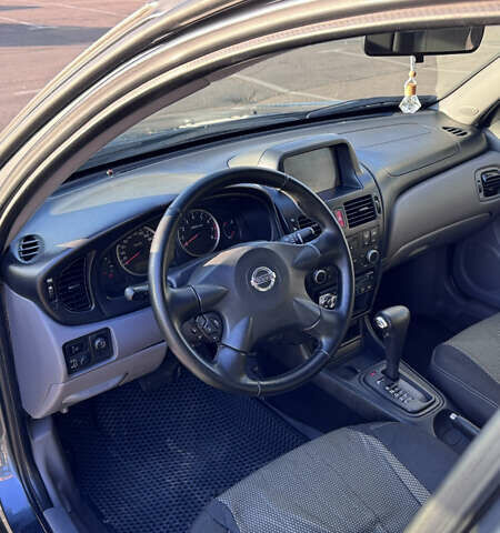 Серый Ниссан Альмера, объемом двигателя 1.8 л и пробегом 181 тыс. км за 4400 $, фото 14 на Automoto.ua