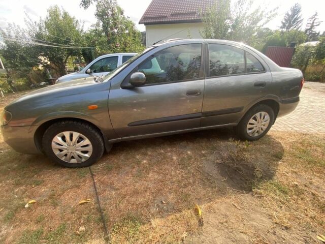 Серый Ниссан Альмера, объемом двигателя 1.5 л и пробегом 227 тыс. км за 2800 $, фото 3 на Automoto.ua