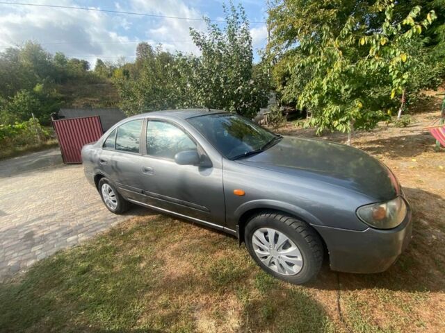 Серый Ниссан Альмера, объемом двигателя 1.5 л и пробегом 227 тыс. км за 2800 $, фото 2 на Automoto.ua