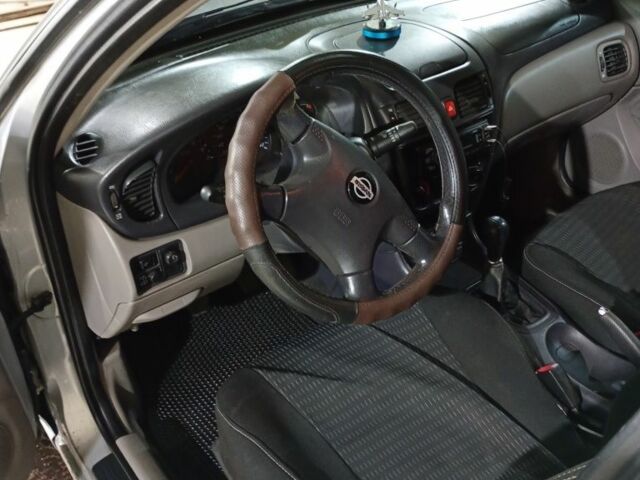 Серый Ниссан Альмера, объемом двигателя 1.5 л и пробегом 300 тыс. км за 2700 $, фото 7 на Automoto.ua