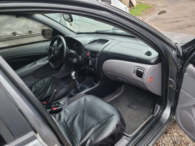 Серый Ниссан Альмера, объемом двигателя 1.5 л и пробегом 380 тыс. км за 3000 $, фото 3 на Automoto.ua