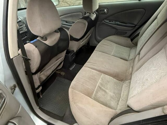 Серый Ниссан Альмера, объемом двигателя 2.2 л и пробегом 260 тыс. км за 1300 $, фото 2 на Automoto.ua