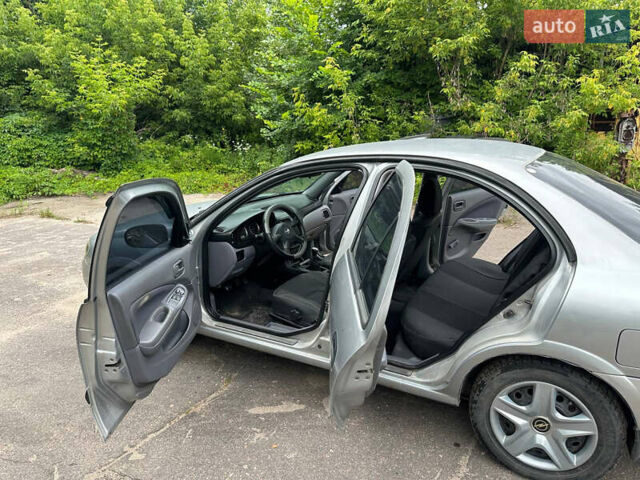 Серый Ниссан Альмера, объемом двигателя 1.5 л и пробегом 303 тыс. км за 2350 $, фото 13 на Automoto.ua