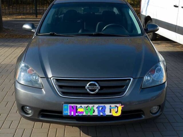 Серый Ниссан Альмера, объемом двигателя 1.5 л и пробегом 325 тыс. км за 3500 $, фото 2 на Automoto.ua