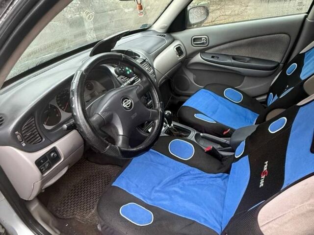 Серый Ниссан Альмера, объемом двигателя 2.2 л и пробегом 260 тыс. км за 1300 $, фото 1 на Automoto.ua