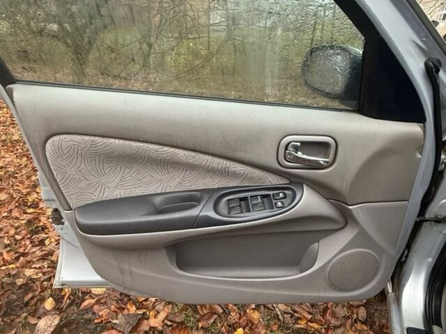 Серый Ниссан Альмера, объемом двигателя 2.2 л и пробегом 260 тыс. км за 1300 $, фото 3 на Automoto.ua