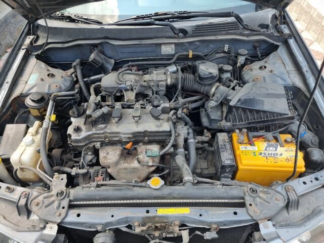 Серый Ниссан Альмера, объемом двигателя 1.5 л и пробегом 400 тыс. км за 3400 $, фото 7 на Automoto.ua