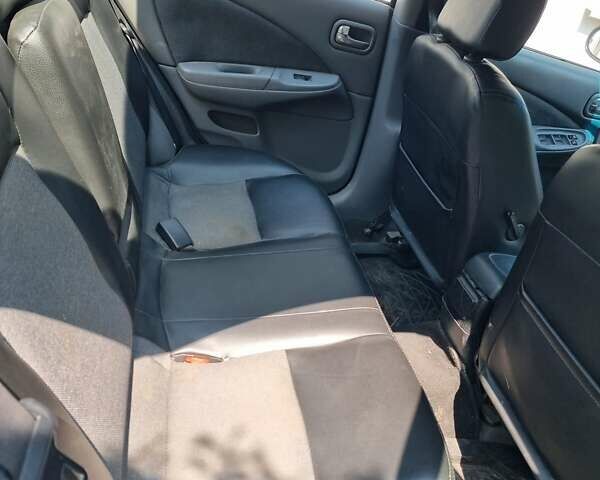 Серый Ниссан Альмера, объемом двигателя 1.8 л и пробегом 500 тыс. км за 3400 $, фото 5 на Automoto.ua