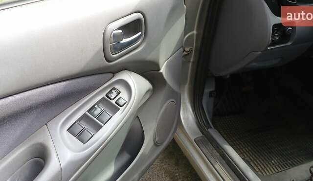 Серый Ниссан Альмера, объемом двигателя 1.5 л и пробегом 380 тыс. км за 2100 $, фото 1 на Automoto.ua