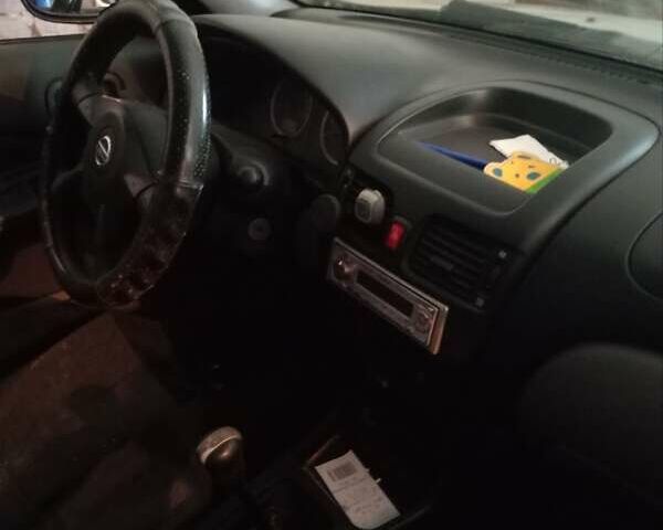 Серый Ниссан Альмера, объемом двигателя 1.8 л и пробегом 120 тыс. км за 3800 $, фото 3 на Automoto.ua