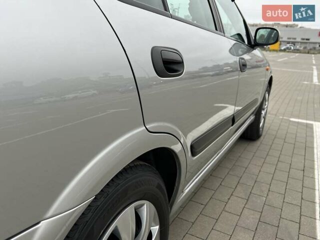 Серый Ниссан Альмера, объемом двигателя 1.5 л и пробегом 140 тыс. км за 4600 $, фото 16 на Automoto.ua