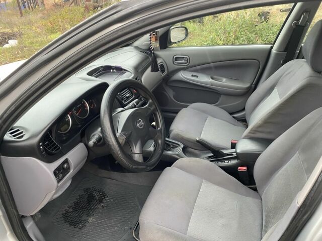 Серый Ниссан Альмера, объемом двигателя 1.5 л и пробегом 181 тыс. км за 2850 $, фото 11 на Automoto.ua