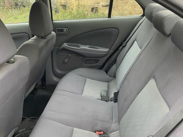 Серый Ниссан Альмера, объемом двигателя 1.5 л и пробегом 181 тыс. км за 2850 $, фото 12 на Automoto.ua