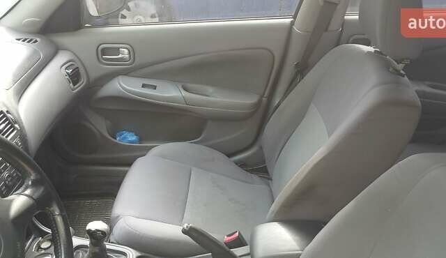 Серый Ниссан Альмера, объемом двигателя 1.5 л и пробегом 380 тыс. км за 2100 $, фото 4 на Automoto.ua