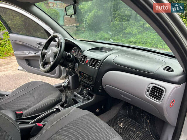 Серый Ниссан Альмера, объемом двигателя 1.5 л и пробегом 303 тыс. км за 2499 $, фото 11 на Automoto.ua