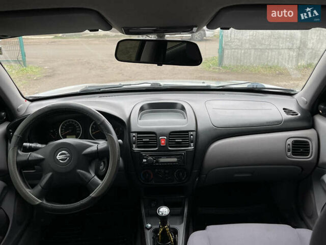 Сірий Ніссан Альмера, об'ємом двигуна 1.5 л та пробігом 302 тис. км за 2900 $, фото 6 на Automoto.ua