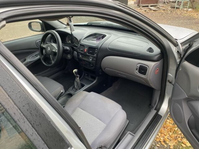 Серый Ниссан Альмера, объемом двигателя 1.5 л и пробегом 181 тыс. км за 2850 $, фото 8 на Automoto.ua