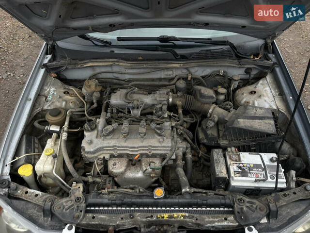 Сірий Ніссан Альмера, об'ємом двигуна 1.5 л та пробігом 302 тис. км за 2900 $, фото 14 на Automoto.ua