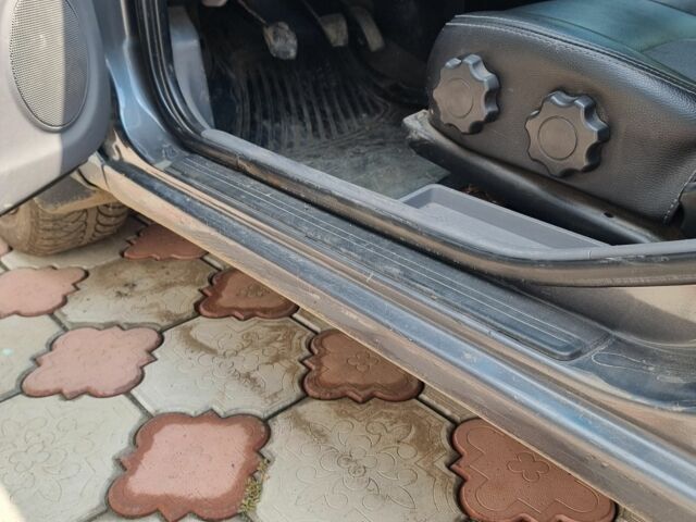 Серый Ниссан Альмера, объемом двигателя 1.5 л и пробегом 400 тыс. км за 3400 $, фото 6 на Automoto.ua