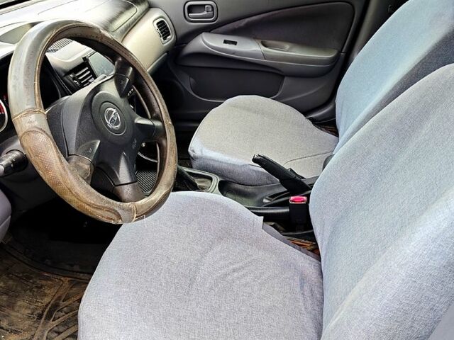 Серый Ниссан Альмера, объемом двигателя 1.5 л и пробегом 299 тыс. км за 3500 $, фото 7 на Automoto.ua