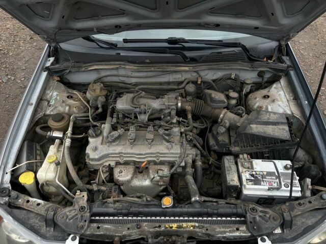 Сірий Ніссан Альмера, об'ємом двигуна 1.5 л та пробігом 302 тис. км за 2900 $, фото 14 на Automoto.ua