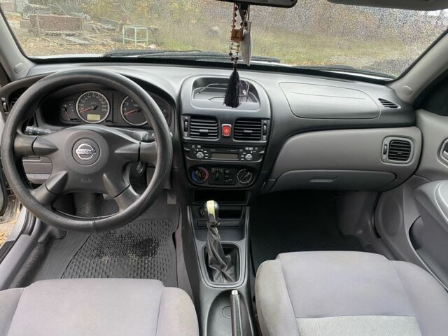 Серый Ниссан Альмера, объемом двигателя 1.5 л и пробегом 181 тыс. км за 2850 $, фото 7 на Automoto.ua