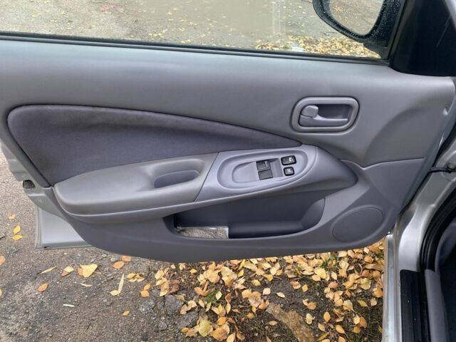 Серый Ниссан Альмера, объемом двигателя 1.5 л и пробегом 181 тыс. км за 2850 $, фото 10 на Automoto.ua