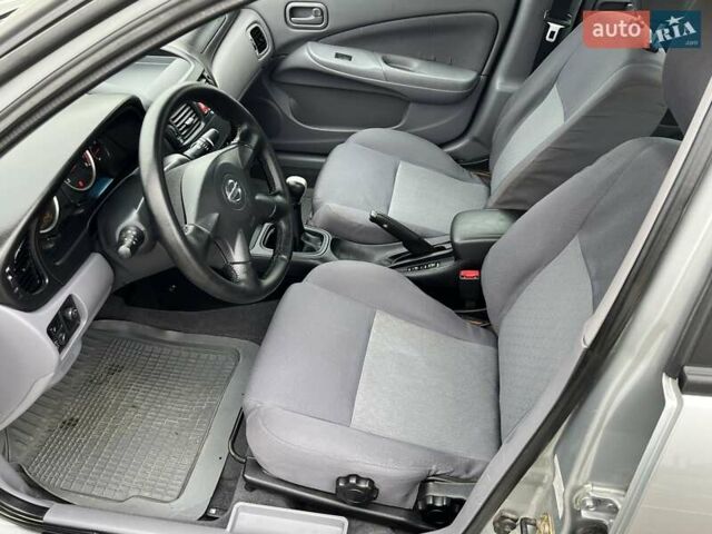 Серый Ниссан Альмера, объемом двигателя 1.5 л и пробегом 140 тыс. км за 4600 $, фото 21 на Automoto.ua