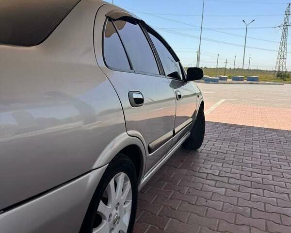 Сірий Ніссан Альмера, об'ємом двигуна 1.77 л та пробігом 240 тис. км за 3799 $, фото 4 на Automoto.ua